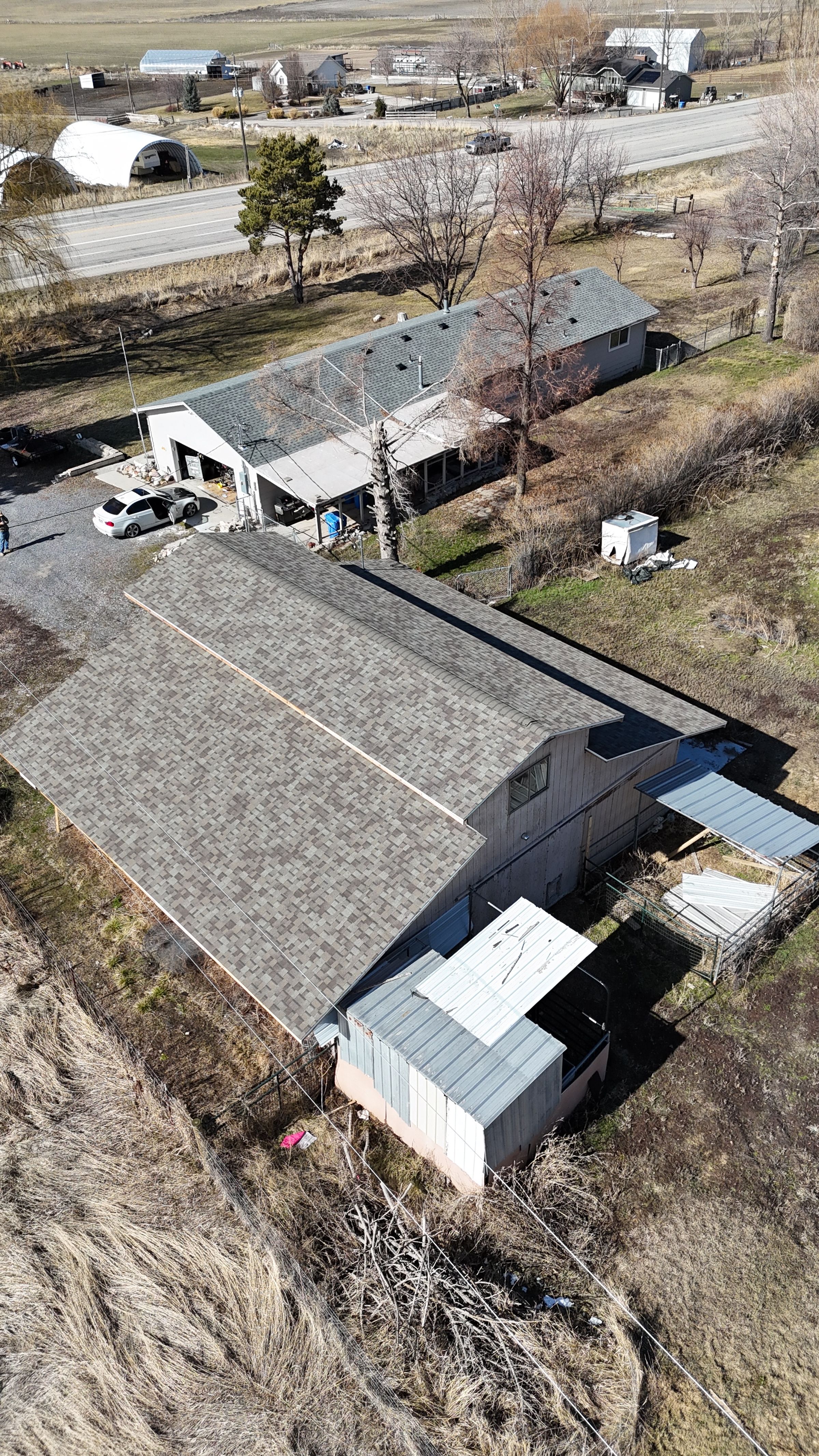 Ranch-style Utah home with a fresh composite shingle roof installed by Rocky MTN Roofing